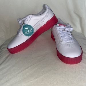 Pink and white pumas